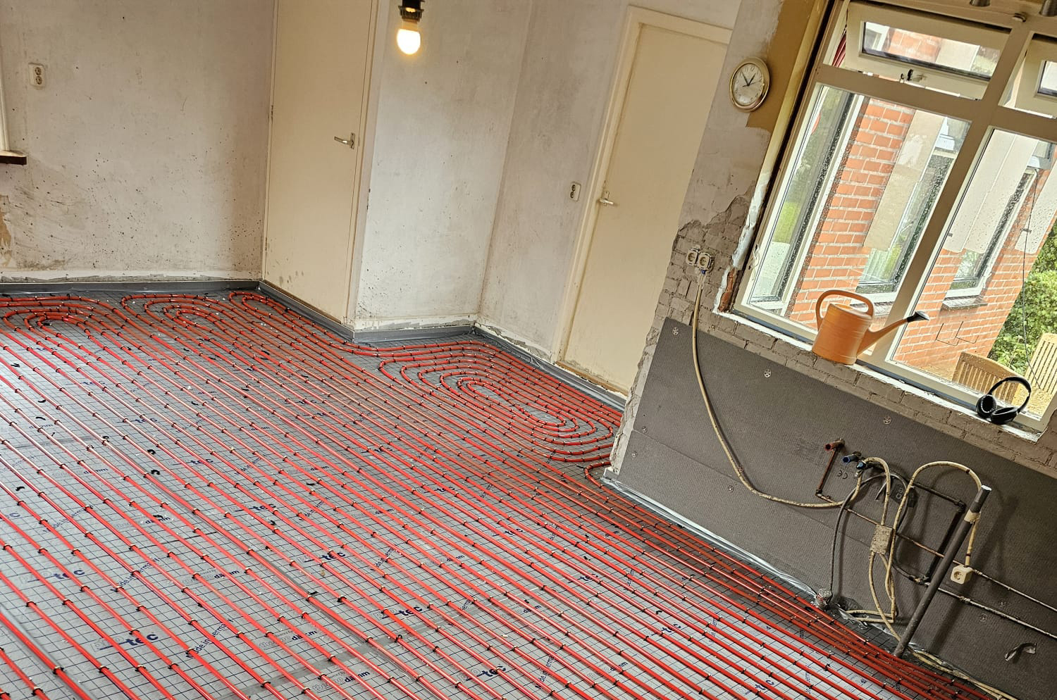Vloerverwarming op beton tackerplaat natbouw Ecotherm